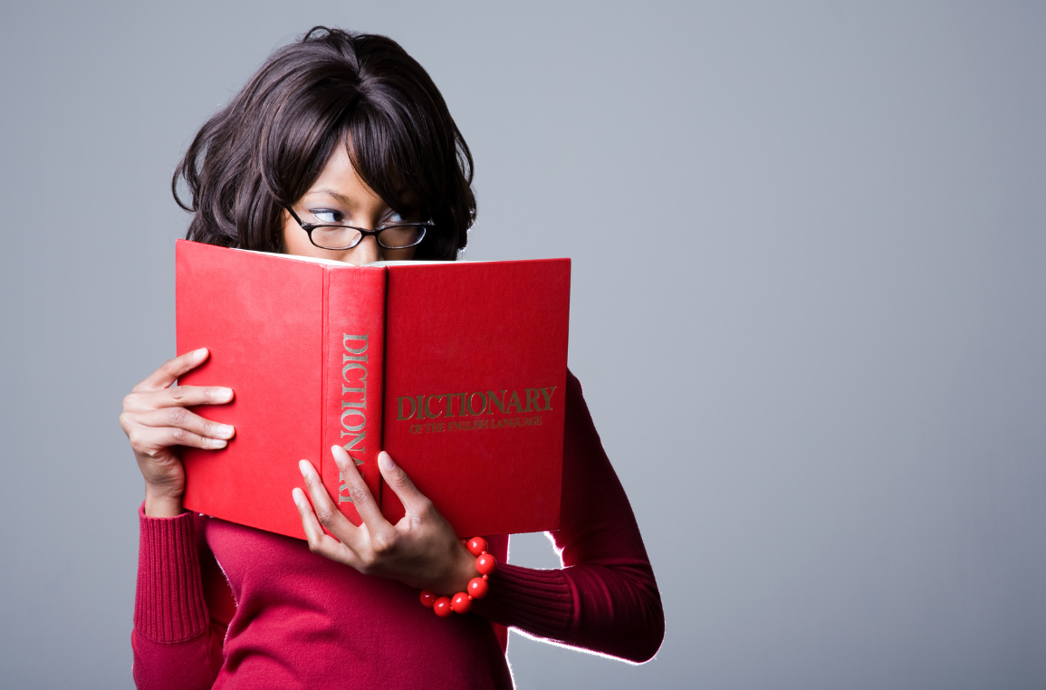 Woman reading Dictionary